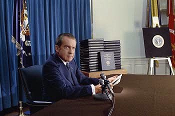 President Nixon, with edited transcripts of Nixon White House Tape conversations during broadcast of his address to the Nation