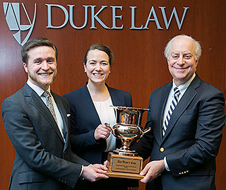 Ethan Wright ’18 and Amelia DeGory ‘17,  winners of the 2017 Dean’s Cup Moot Court, with Dean David F. Levi