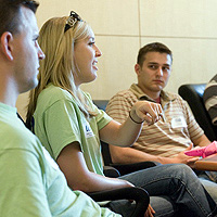 students asking questions at orientation