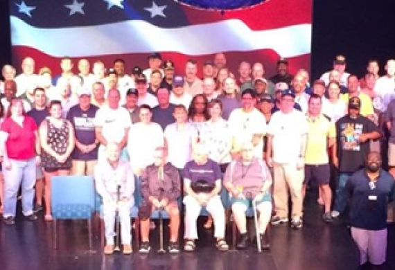 Maj Gen Dunlap meets with other veterans aboard the cruise ship SS Sunshine on Dec. 24, 2015.