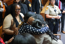 a man and woman in a tight embrace