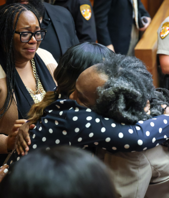 a man and woman in a tight embrace