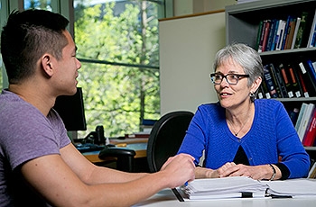 Clinical Professor Carolyn McAllaster, right, with Jerry Fang ’15